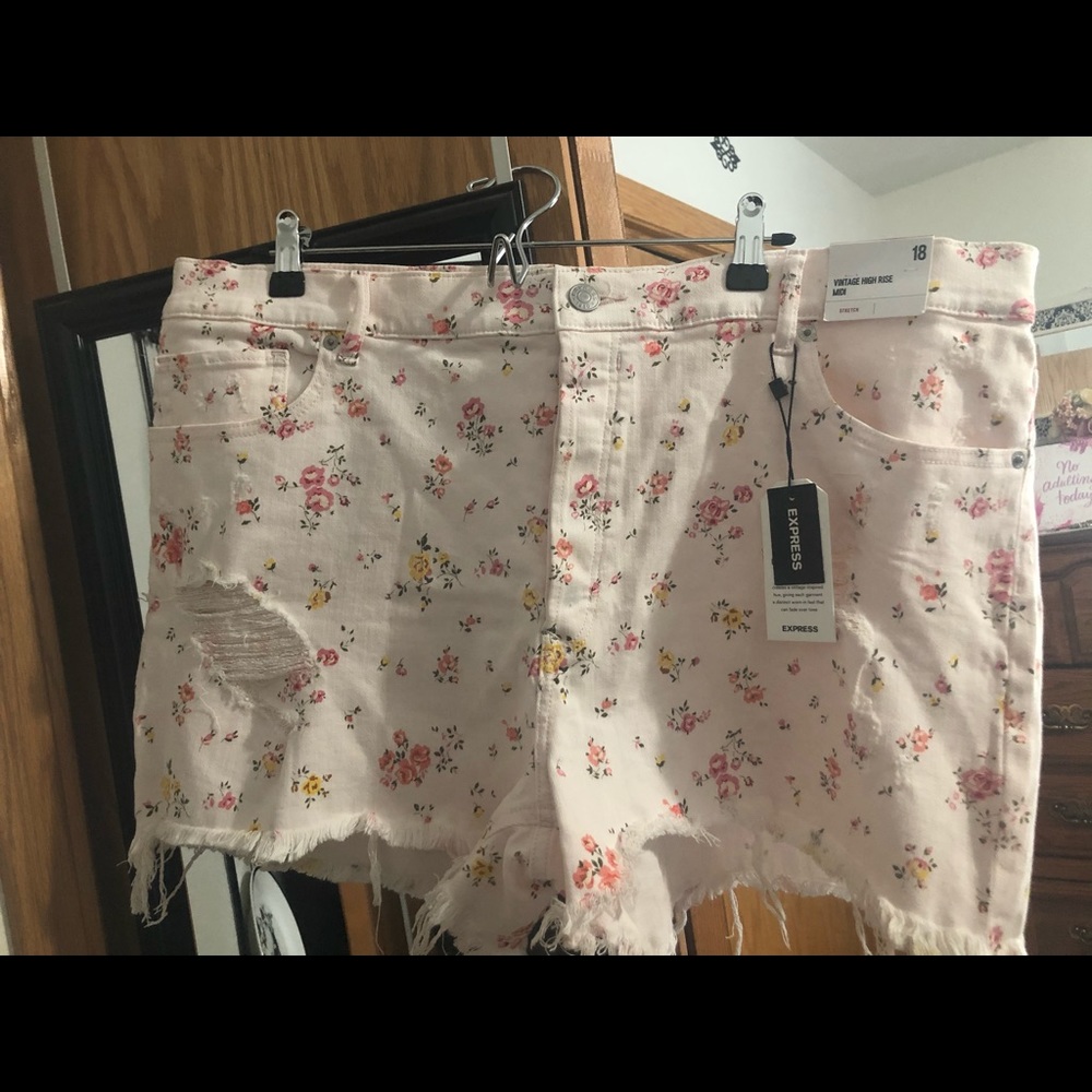 Pretty blush pink distressed shorts